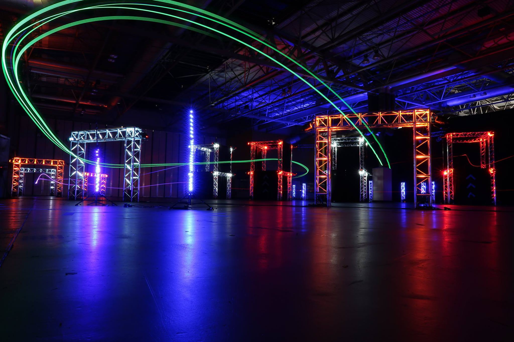 Light trails of green quad spectator corner